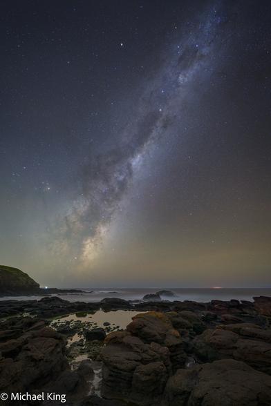The Milky Way rises over the coast at Flinders Blowhole