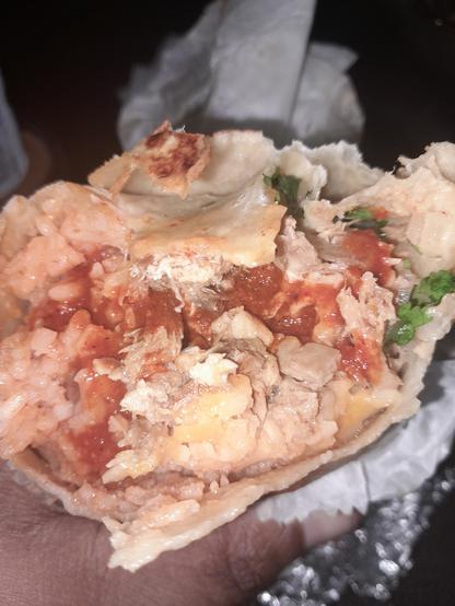 Mouth eye view of the large carnitas burrito.