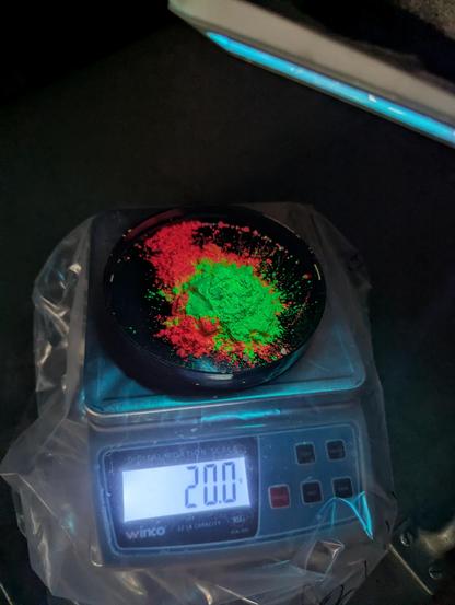 red and green phosphor on a clean black cap- 10 grams of each