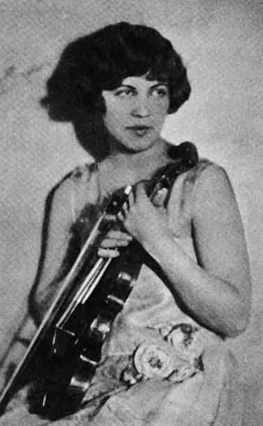 Ilza Niemack, from a 1927 publication; a young white woman with bobbed dark hair, holding a violin