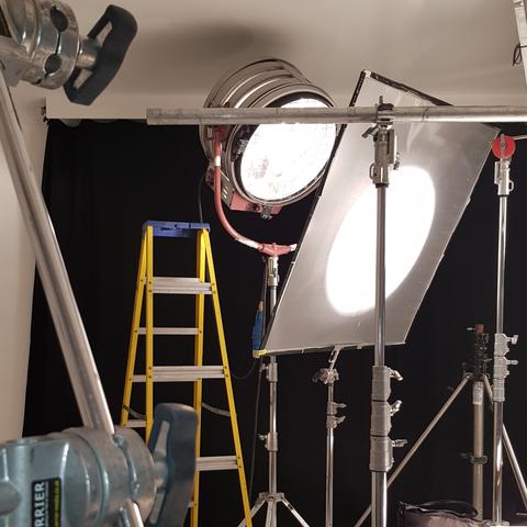Film and television lighting equipment on a film set.