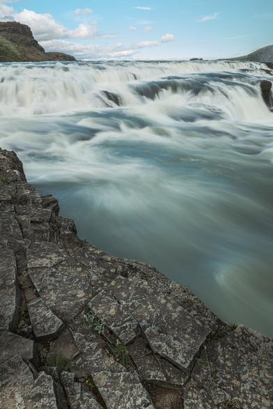 Gullfoss ("Golden Falls") is a waterfall located in the canyon of the Hvítá river in southwest Iceland. It is one of the most popular tourist attractions in the country, and is included in "Golden Circle" tours of the countryside near Reykjavík.