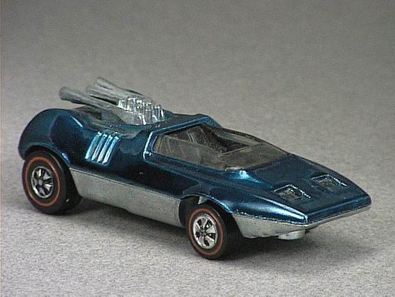 Released in 1970, Spectraflame Aqua Peepin' Bomb of 1970 Hot Wheels with Redline wheels. Notes: Lever raises and lowers headlight covers. Packaging: 1970 Blister. Metal Body, Metal Base. Made in Hong Kong. Scarcity: 5/10