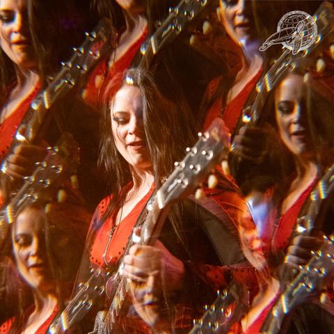 The gems im concert with heavy optical distortion