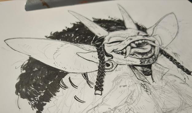 Photograph of a work in progress ink piece by Tealful Eyes of a joyful imp.