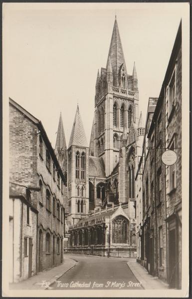 Monochrome real photographic postcard showing a view of the Cathedral from St Mary's Street in Truro, Cornwall.

Published by Penpol Picturecards, photo by Frank Gratton, Mullion, No T32.

Postally used on 19 May 1964 with Truro cancellation and Recorded Delivery slogan postmark on red 2½d stamp and sent to Miss M. Donaldson, 18 Chestnut Road, Kingston-on-Thames, Surrey, and with an interesting message regarding a bellringing conference.

Good condition, with very slight corner bumps, but crease to bottom right corner.