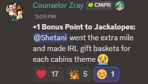 Discord message from Counselor Zray: +1 Bonus Point to Jackalopes: @Shetani went the extra mile and made IRL gift baskets for each cabins theme 😭