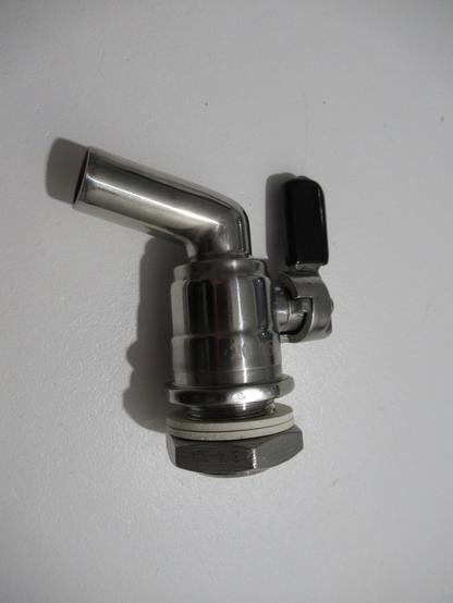 A stainless steel tap for a heated kettle.