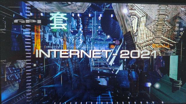 Screengrab from the 1995 film "Johnny Mnemonic", which features an elaborate digital cyberscape with the caption "Internet: 2021" superimposed on the scene.