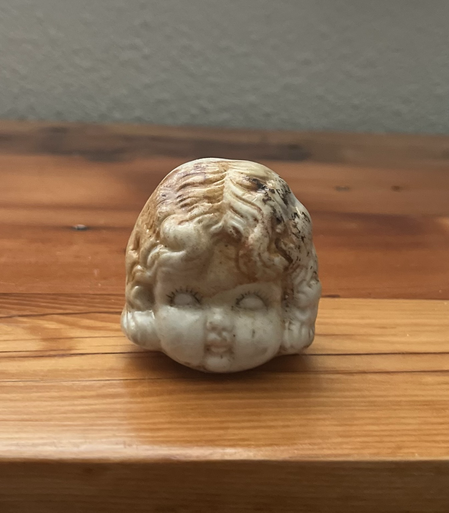 Old porcelain doll head