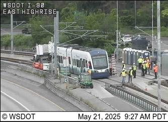 A 2 Line light rail train on the east highrise of I-90 at 9:27am on May 21st, 2025