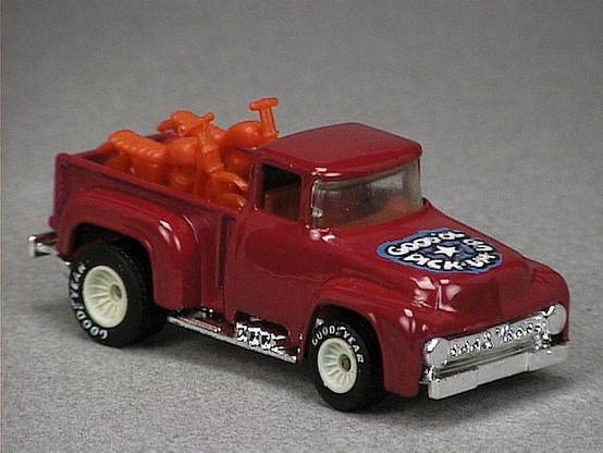 Released in 1985, Plum Good Ol' Pick-Um-Up of 1985 Hot Wheels with Real Riders wheels. Notes: Based on the 1956 Ford Pickup Truck with two red plastic motorcycles in truck bed. Tampo: White, blue and black with star and 'Good 'Ol Pick-Um-Up' on hood. Packaging: 1985 Blister. Metal Body, Plastic Base. Made in Malaysia. Scarcity: 5/10