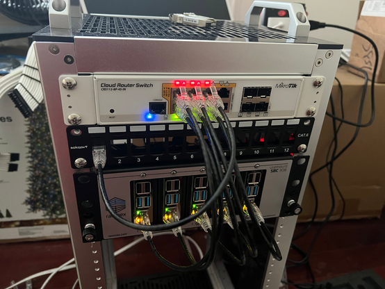 The front of the minirack showing the patch panel installed.  The first port of the panel connects to the QNAP switch mounted in the rear of the minirack.