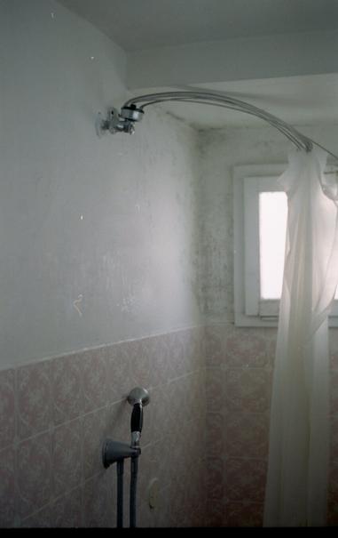 A shower lit from a window