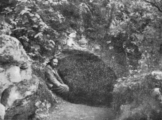 The image appears to depict a person sitting near a large, circular cave or hollowed structure in a natural setting, surrounded by foliage and rocks. The scene seems to have an old or historical feel, possibly suggesting exploration or archaeology. If you have any specific questions about the image or its context, feel free to ask!

Image Credits: Wikimedia / Kovács József bútorasztalos (Debrecen, 1906. január 26. – Sztorozsevoje, 1943. január 13.) / Public domain
