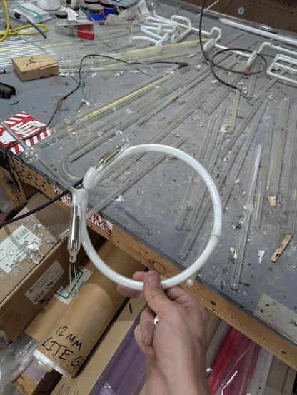 out of focus white glass circle with wholesale style side tubulation. Its actually all clear glass- I added the white phosphor coating and bent it and stuck them together