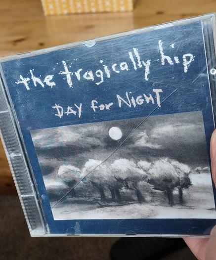 Cracked and scratched CD case.