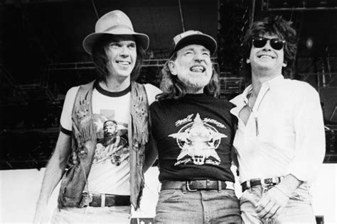 Neil, Willie and John on the stage at the. first “Farm Aid”, 22 October 1985.

source https://www.rollingstone.com/music/music-news/neil-young-farm-aid-1985-hey-hey-my-my-1216163/