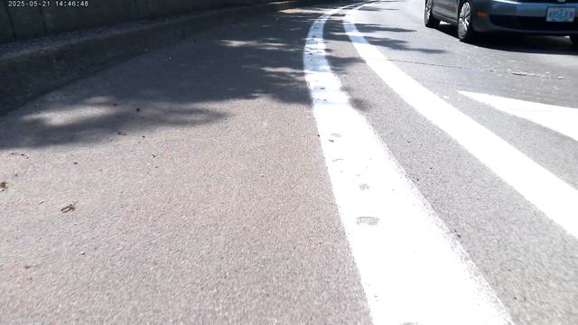 driver catching up with me from 1/4 mile of CapitolHwy that has no bike lane until it reaches the ramp crossing Barbur Blvd, pictured