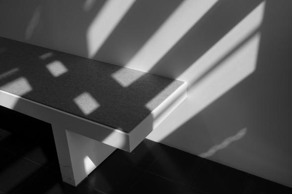 Sunspots of a window on a bench