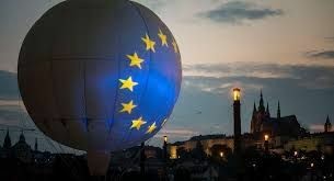 A large balloon featuring the European flag, showcasing its blue background and yellow stars in a festive display.