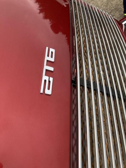 Deep red electric Porsche 912, badging on engine cover