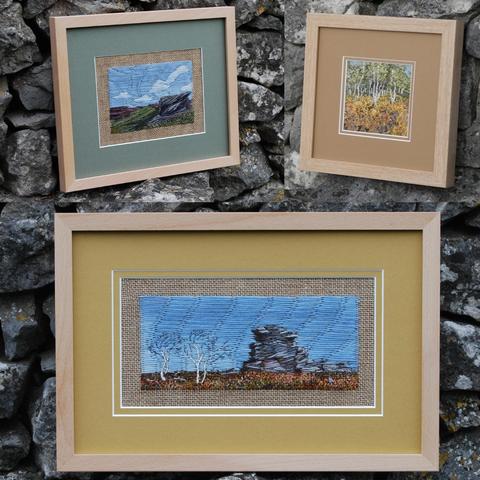 Collage of three framed stitched artworks depicting moorland with gritstone rocks, heather and silver birch trees