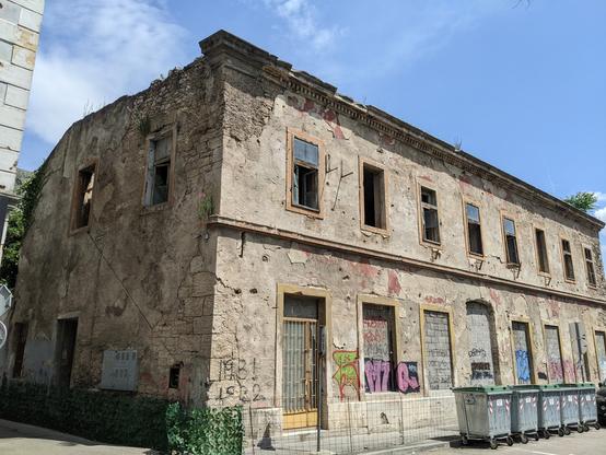 Old dilapidated corner building