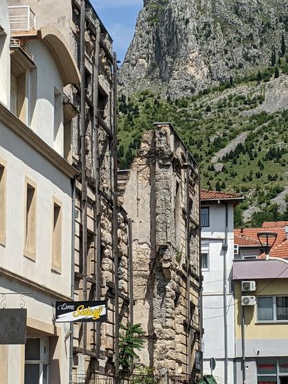 Old ruin facade in a Mostar streetscape