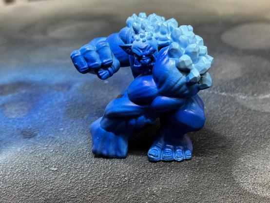 The troll from the front with brightened crystals on his back.