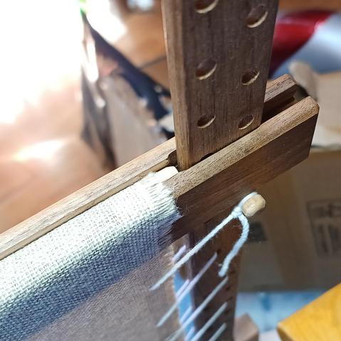 Close up of a Siesta Slate Frame showing the fabric held in a groove by a dowel