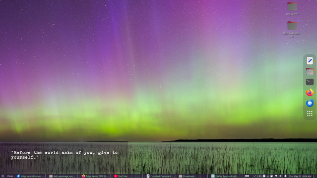 This is the screenshot of my PC desktop screen. It is a lake with a sky full of night colours in a Northern country.