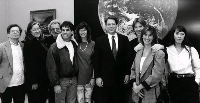 Left to right: Dennis McNally, Mountain Girl, Jerry Garcia, Mickey & Caryl Hart, Al Gore, Phil & Jill Lesh, Cassidy Law

standing in front of a large image of the Earth from Space and another smaller framed picture on the wall.