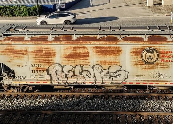 Train car with graffiti rolling through Kamloops BC Canada