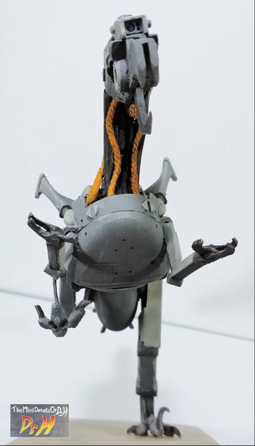 Low angle from the front of the Dino-bot.