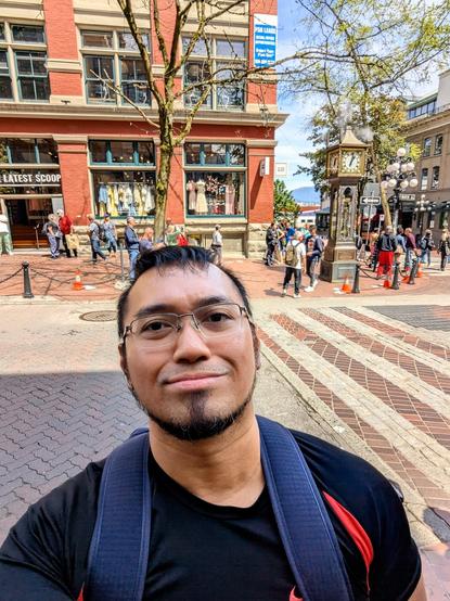 Just me posing at Gastown with the iconic steam clock behind me across the street.