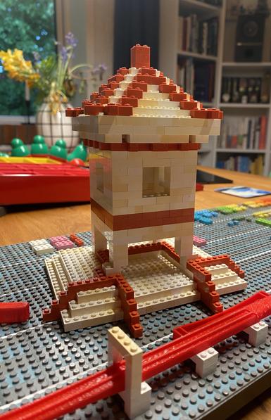 A pagoda for your thoughts. Red and white brick tower