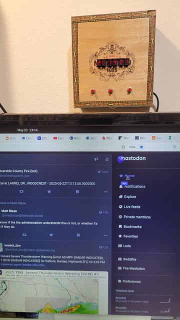 Computer monitor on Mastodon with cigar box in background