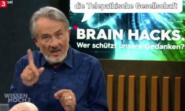 Gert Scobel mit erhobenem Zeigefinger, spruch: die Thelepathische Gesellschaft.