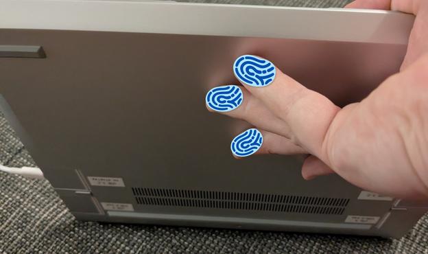 Photo from below, showing that my (again, censored) fingers, especially the middle and ring finger, are placed pretty far into the direction of the center of the case.