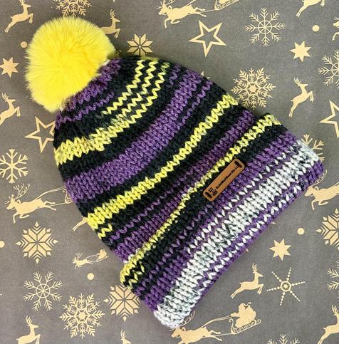 Non-Binary colored hand knit double thick beanie! Made to fit most all adult heads with a faux rabbit fur pom pom on top!
