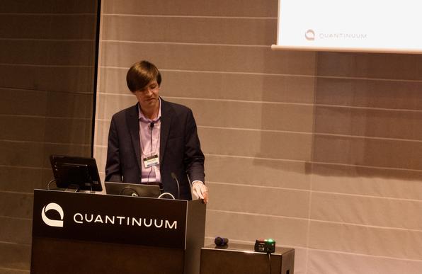 Nathan Lysne standing behind a podium.