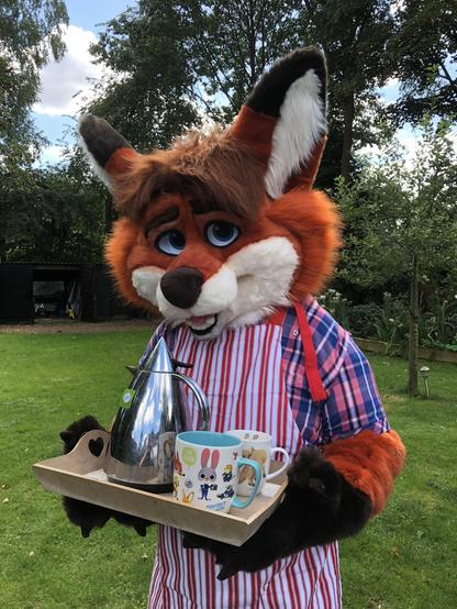 A fox fursuit carrying a tray with drinks