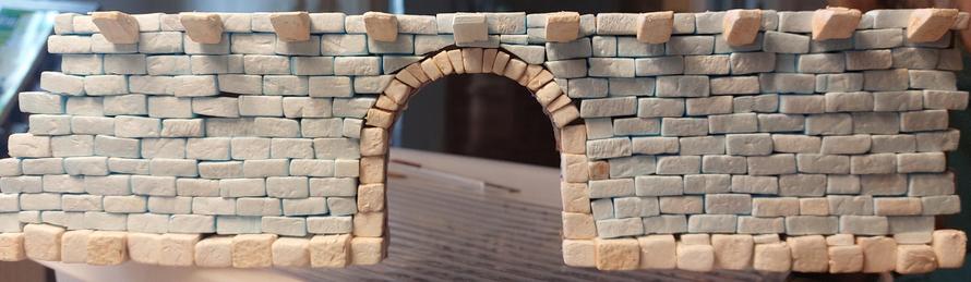Xps stone wall with poorly built arch