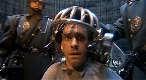 The main character Sam Lowry in the movie "Brazil" portrayed by Jonathan Pryce. 

In this film, Sam Lowry, tortured by the compliant henchmen of a few power-hungry rich who manifest their power through a totalitarian state structure and absolute control of information, hallucinates the entire plot of the story. Reality and madness (suffered through torture) merge into one utopian experience.