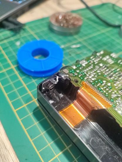 replaced battery pin inside a cassette player