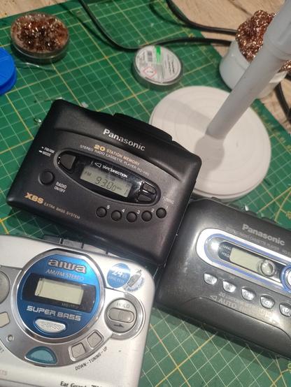 three cassette players, one aiwa and two panasonic