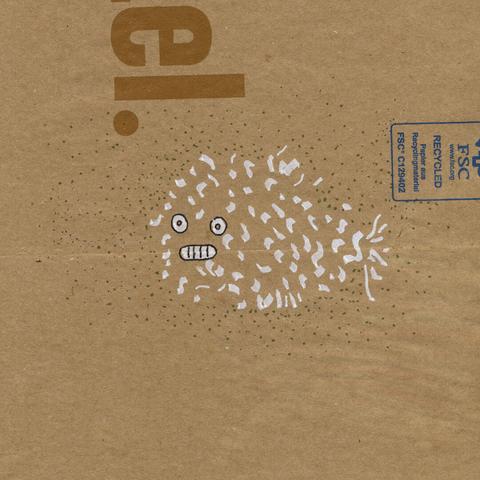 A drawing on a brown paper bag. Little dota and white shapes form a wish with a tense facial expression. Parts of the bag‘s printing are visible: the letters „el.“ at the top of the image, and a box with small blue text at the right border.