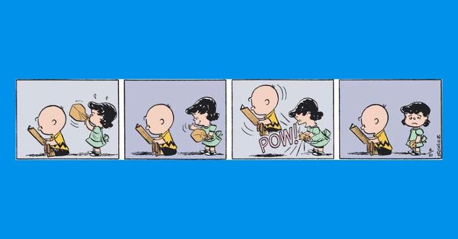 A comic strip featuring two children, one boy reading a book and another girl with a paper bag full of air behind him, unseen. The girl pops the bag with a POW sound, but the boy continues to ignore her by reading his book.