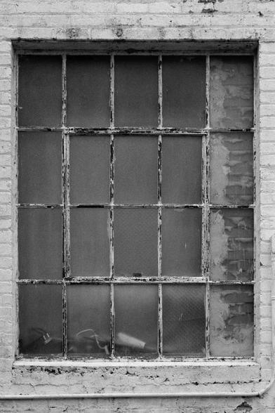 A hazy and rusted-up looking window